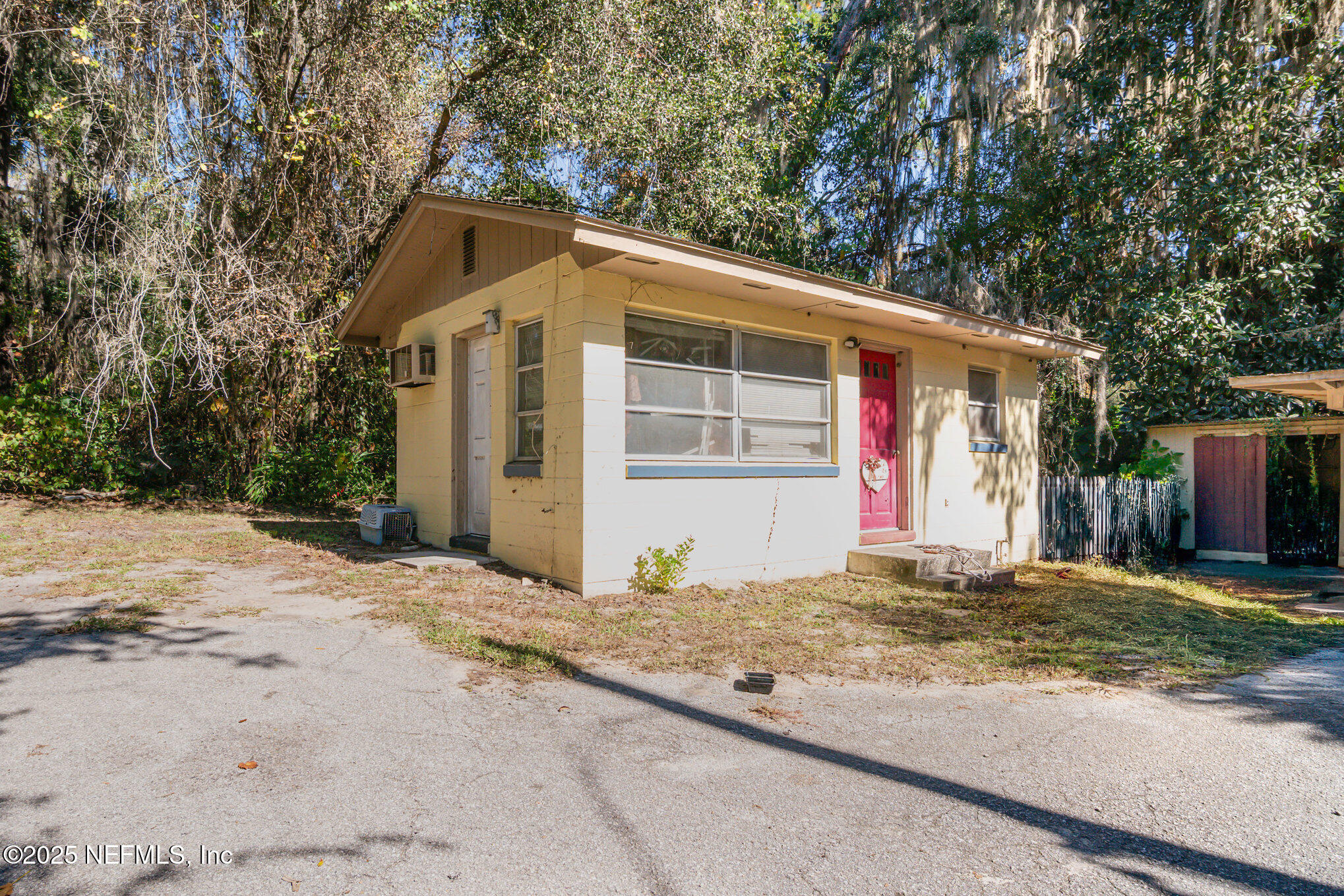7838 State Road 21 Keystone Heights, FL 32656 - Photo 20 of 22 a front view of a house with a yard