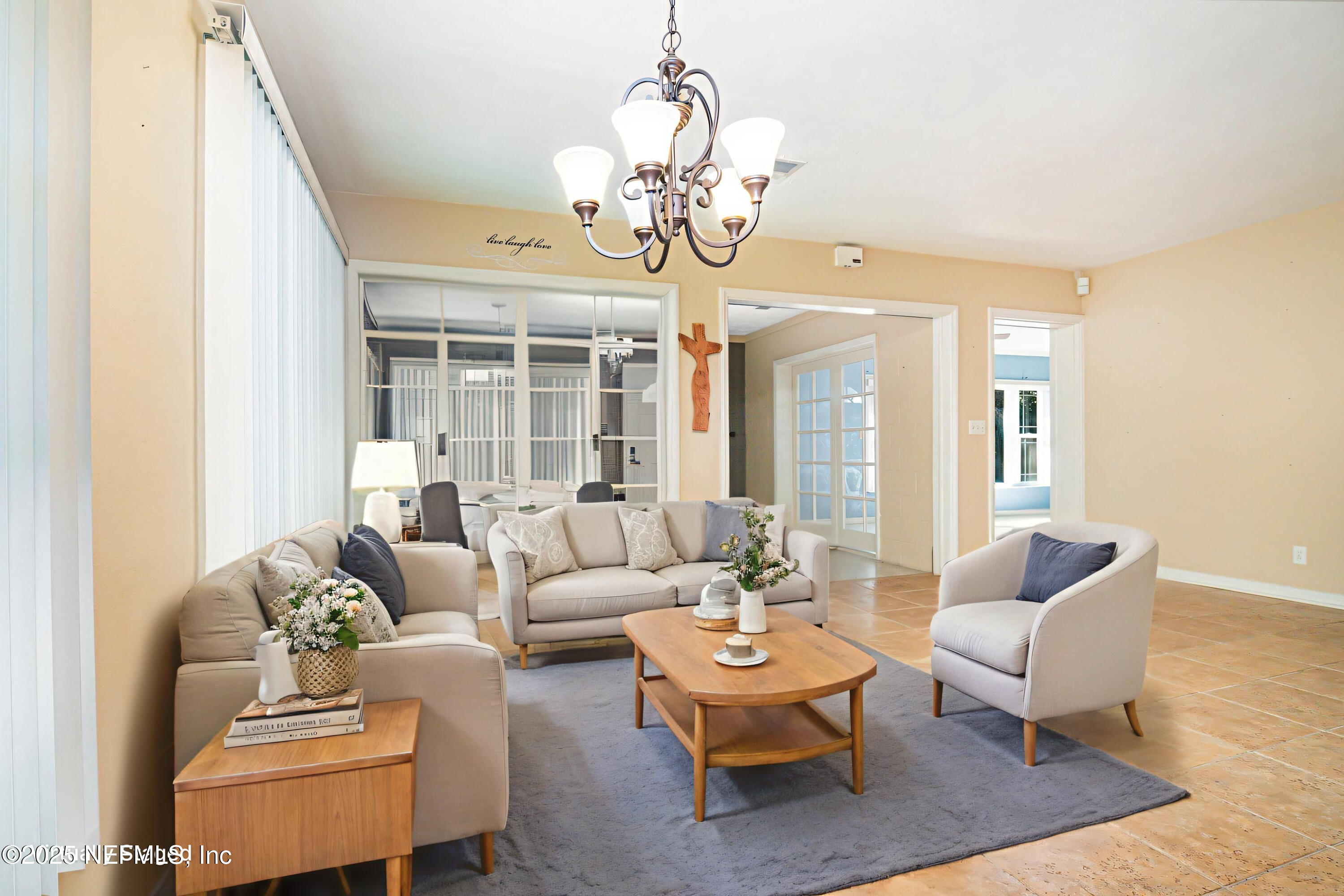 7838 State Road 21 Keystone Heights, FL 32656 - Photo 5 of 22 a living room with couches a table and chairs
