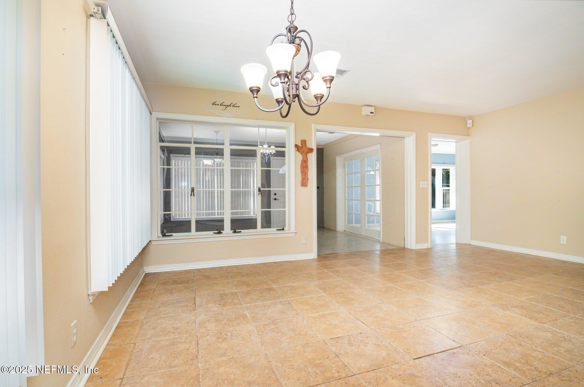 7838 State Road 21 Keystone Heights, FL 32656 - Photo 6 of 22 a view of an empty room with a window