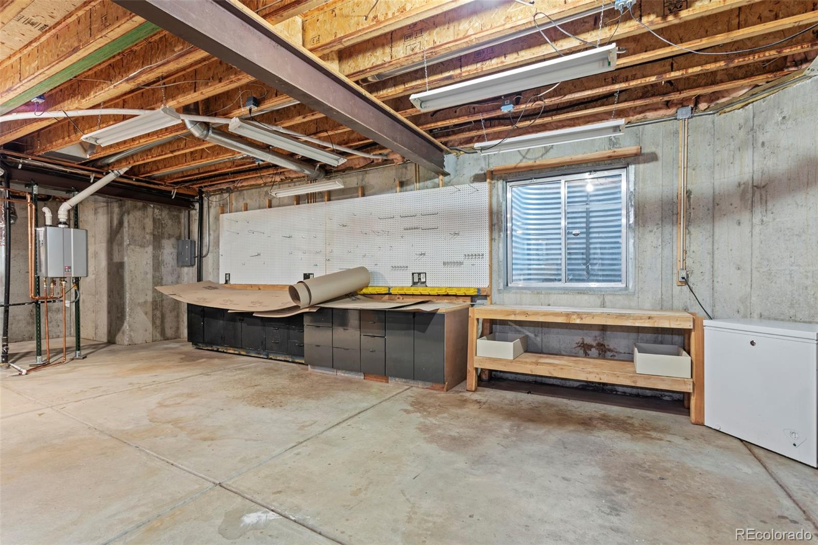 5703 Fig Way Arvada, CO 80002 - Photo 34 of 40 a view of storage and utility room