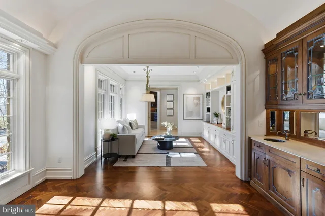 a view of a livingroom with furniture and a window