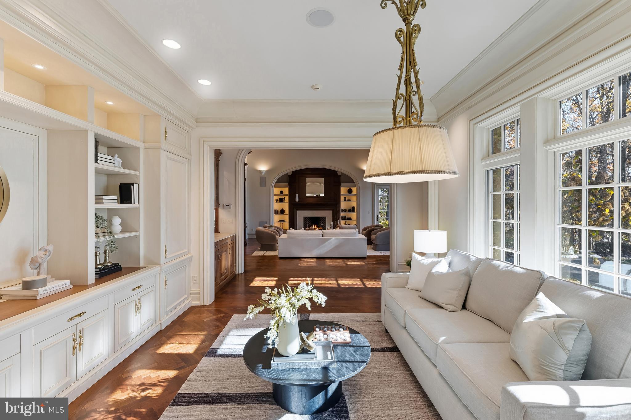 11315 John Carroll Road Owings Mills, MD 21117 - Photo 26 of 85 a living room with furniture a chandelier a rug and a chandelier
