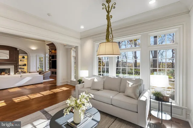 a front view of a house with entryway and wooden floor