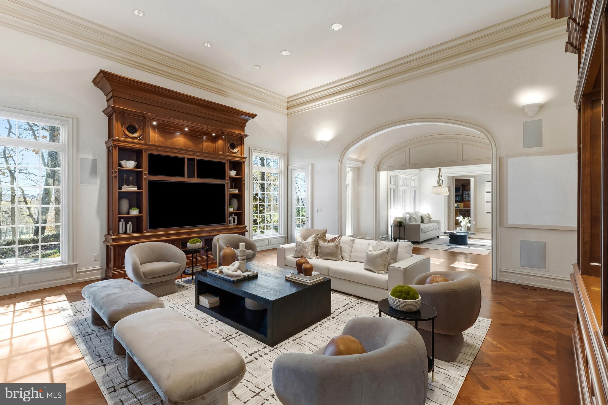 11315 John Carroll Road Owings Mills, MD 21117 - Photo 29 of 85 a living room with furniture flat screen tv and a large window