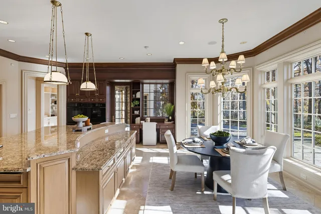 a view of a chandelier fan in a room