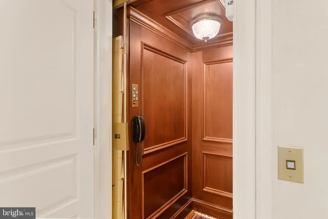 a view of house with yard and green space