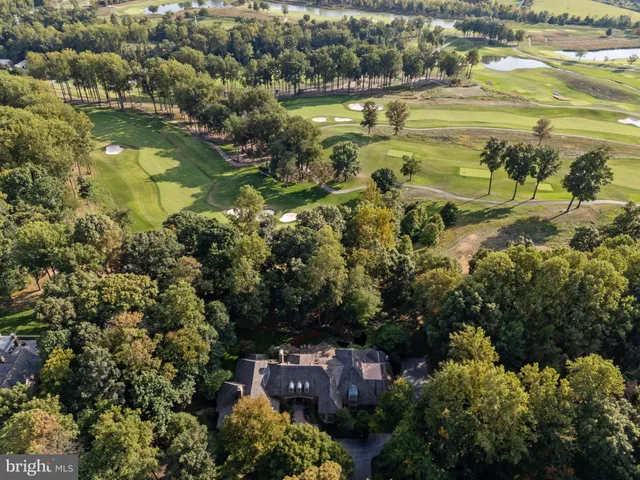 a view of a brick building with a yard