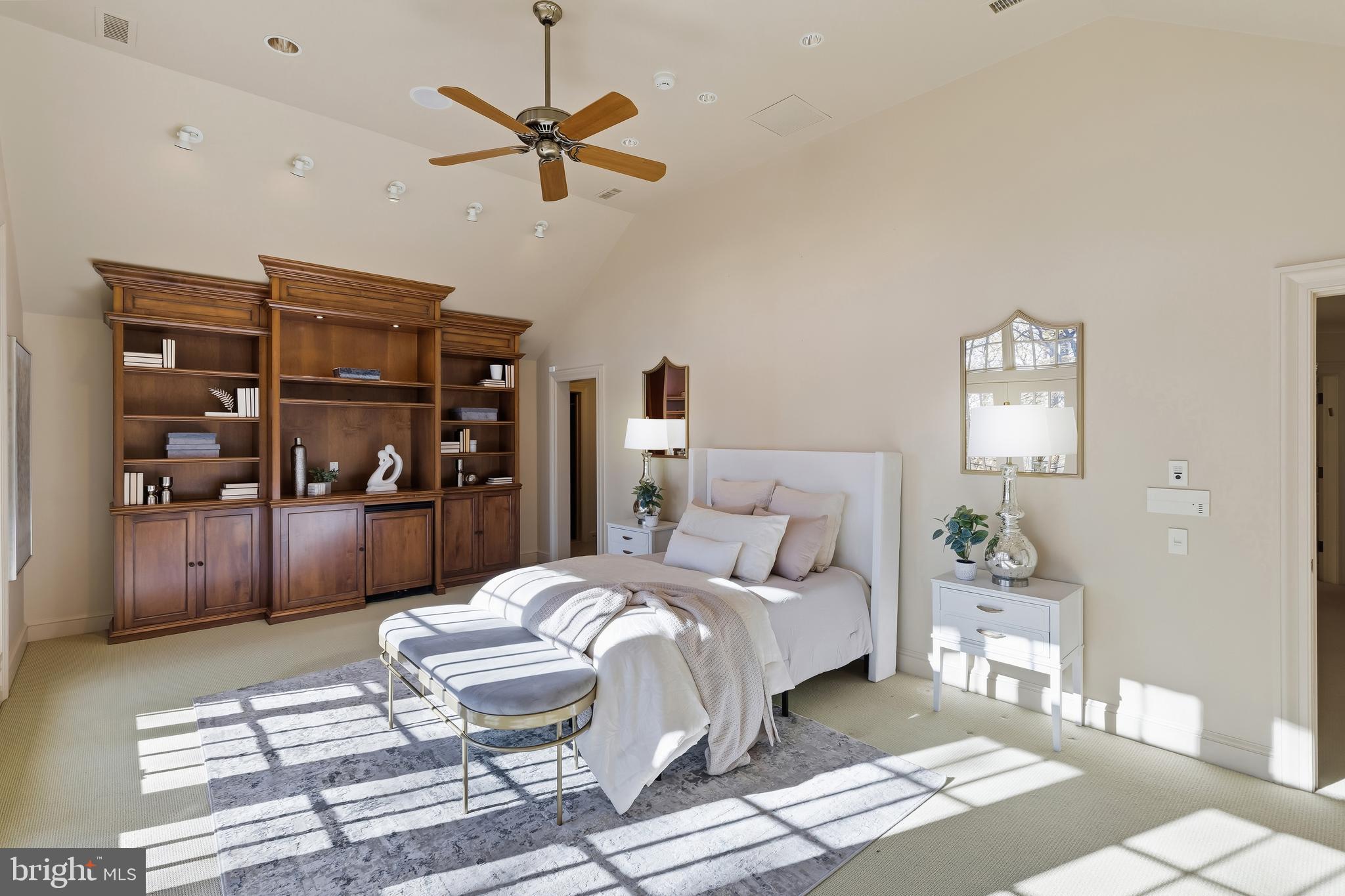 11315 John Carroll Road Owings Mills, MD 21117 - Photo 58 of 85 a bedroom with a large bed and a chandelier