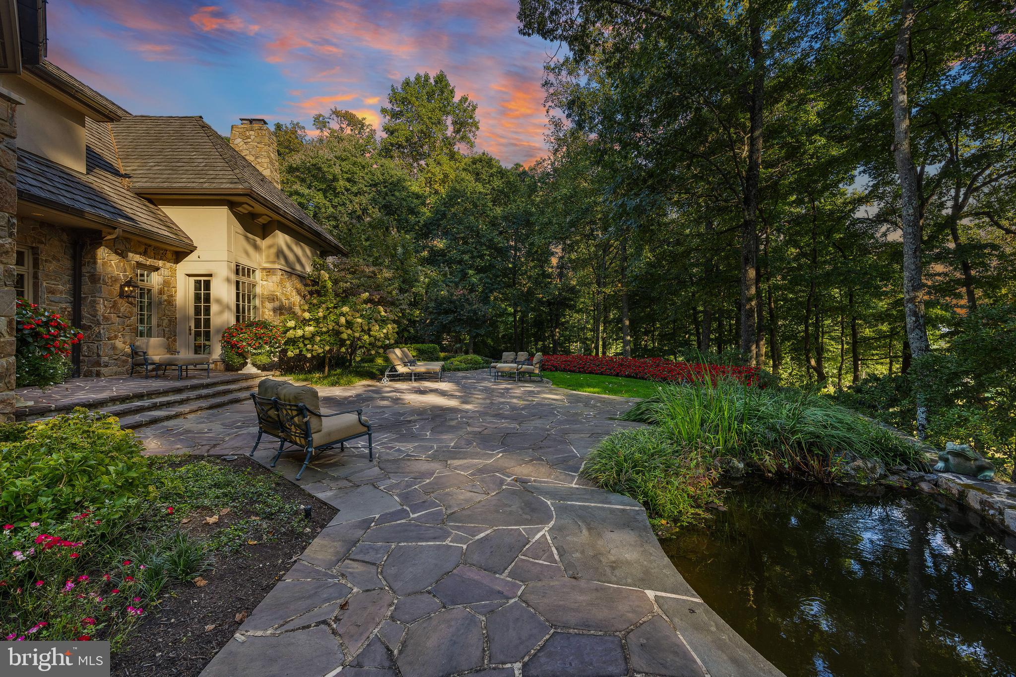 11315 John Carroll Road Owings Mills, MD 21117 - Photo 69 of 85 a view of a patio with table and chairs and potted plants