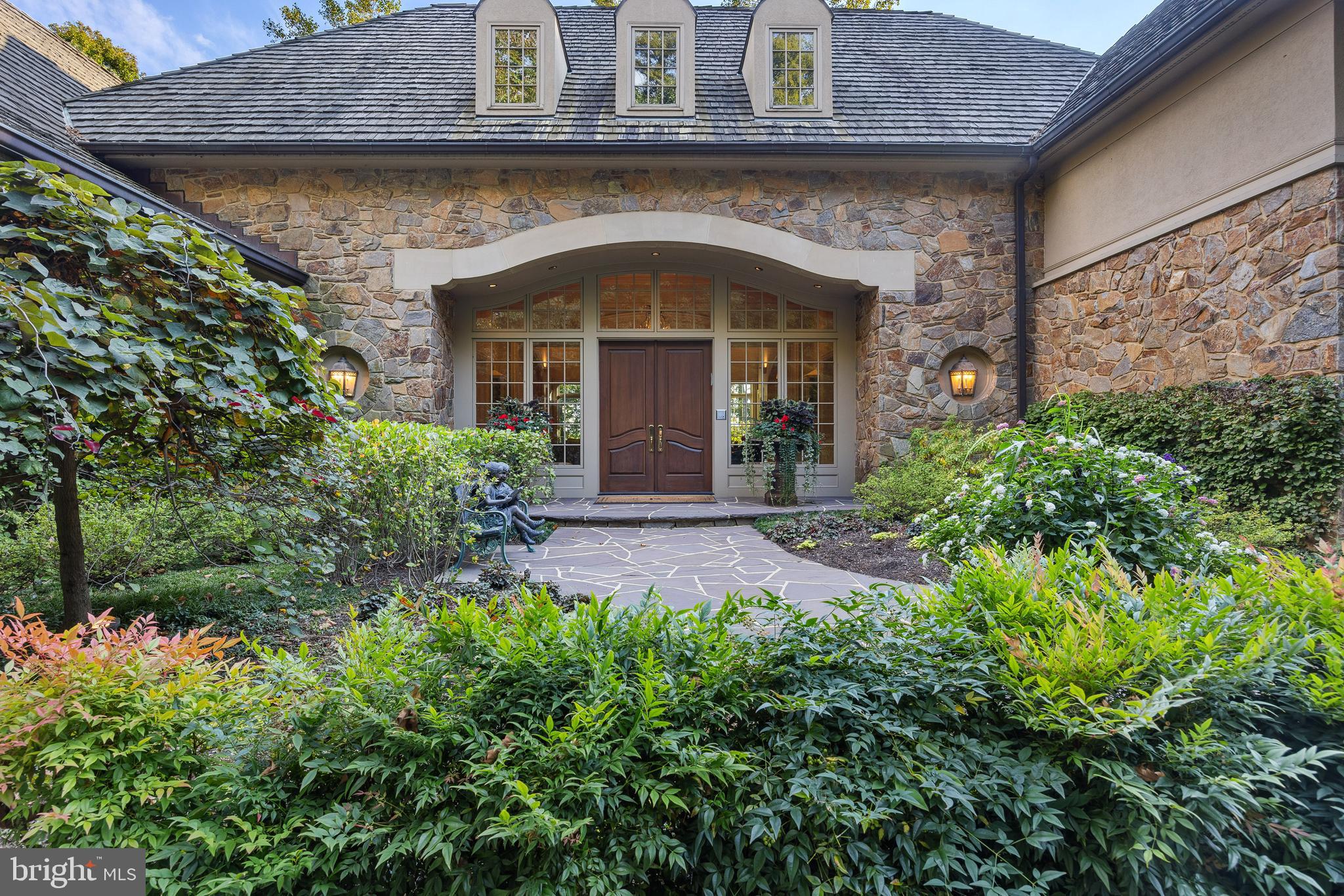 11315 John Carroll Road Owings Mills, MD 21117 - Photo 84 of 85 a front view of a house with garden