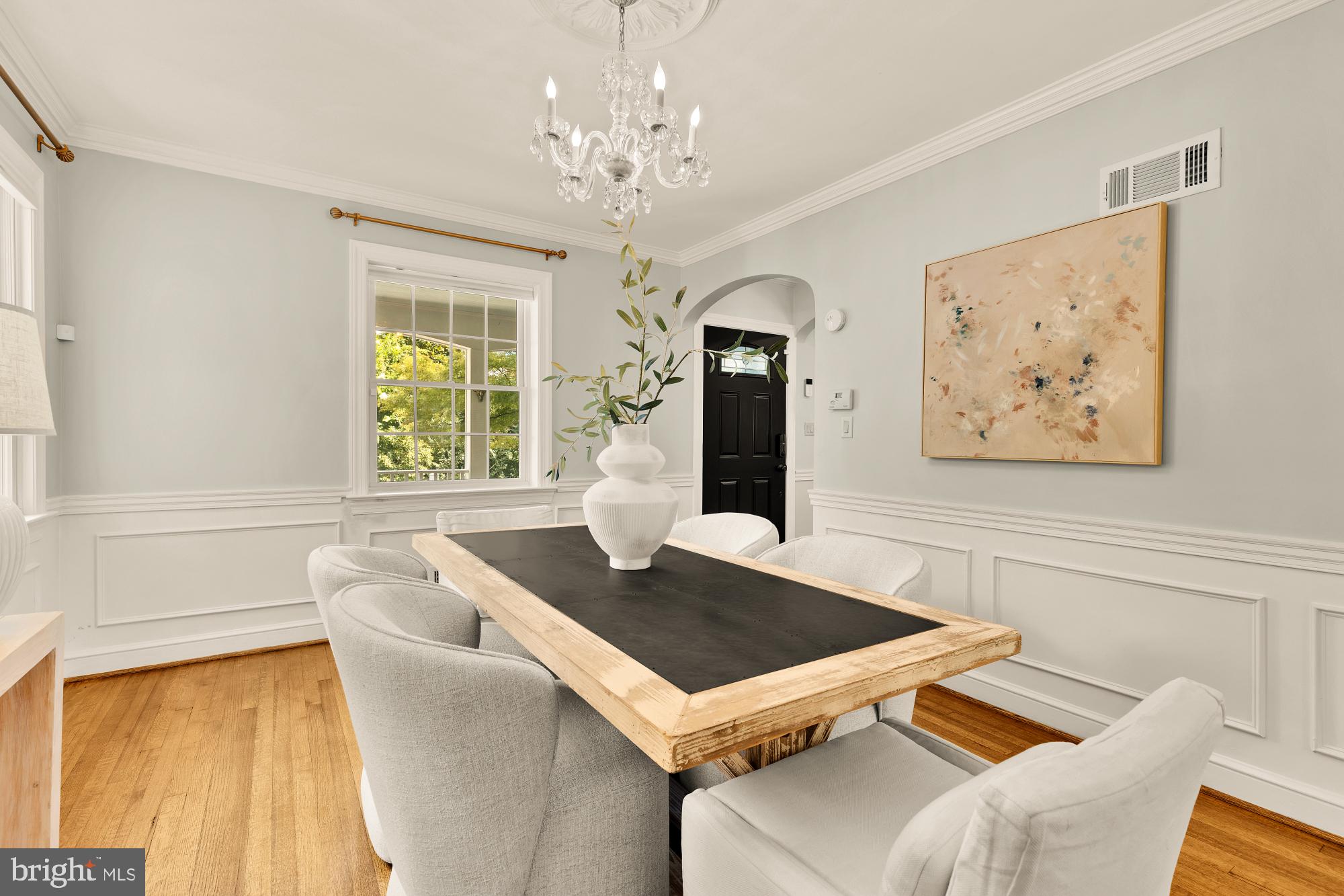 6038 Fort Hunt Road Alexandria, VA 22307 - Photo 15 of 49 a living room with furniture and a chandelier