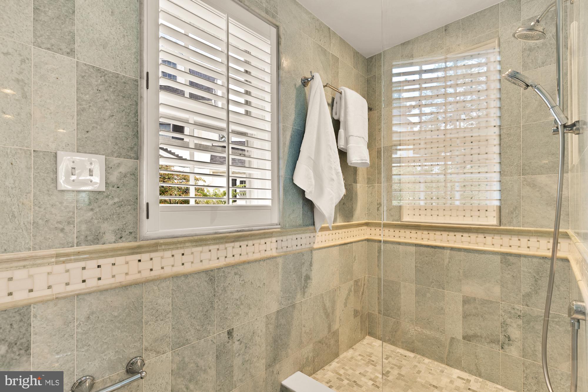 6038 Fort Hunt Road Alexandria, VA 22307 - Photo 29 of 49 a bathroom with a bathtub and shower