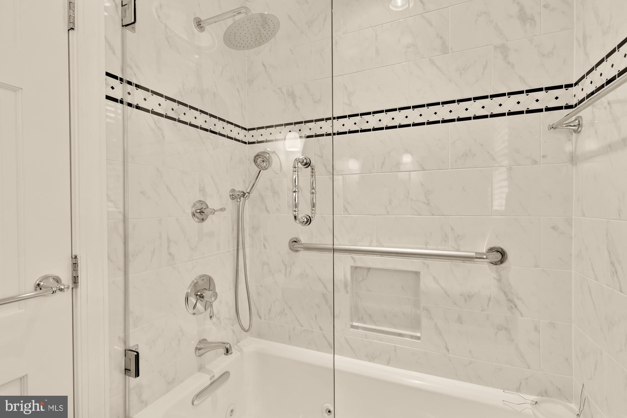 6038 Fort Hunt Road Alexandria, VA 22307 - Photo 33 of 49 a bathroom with a glass shower door
