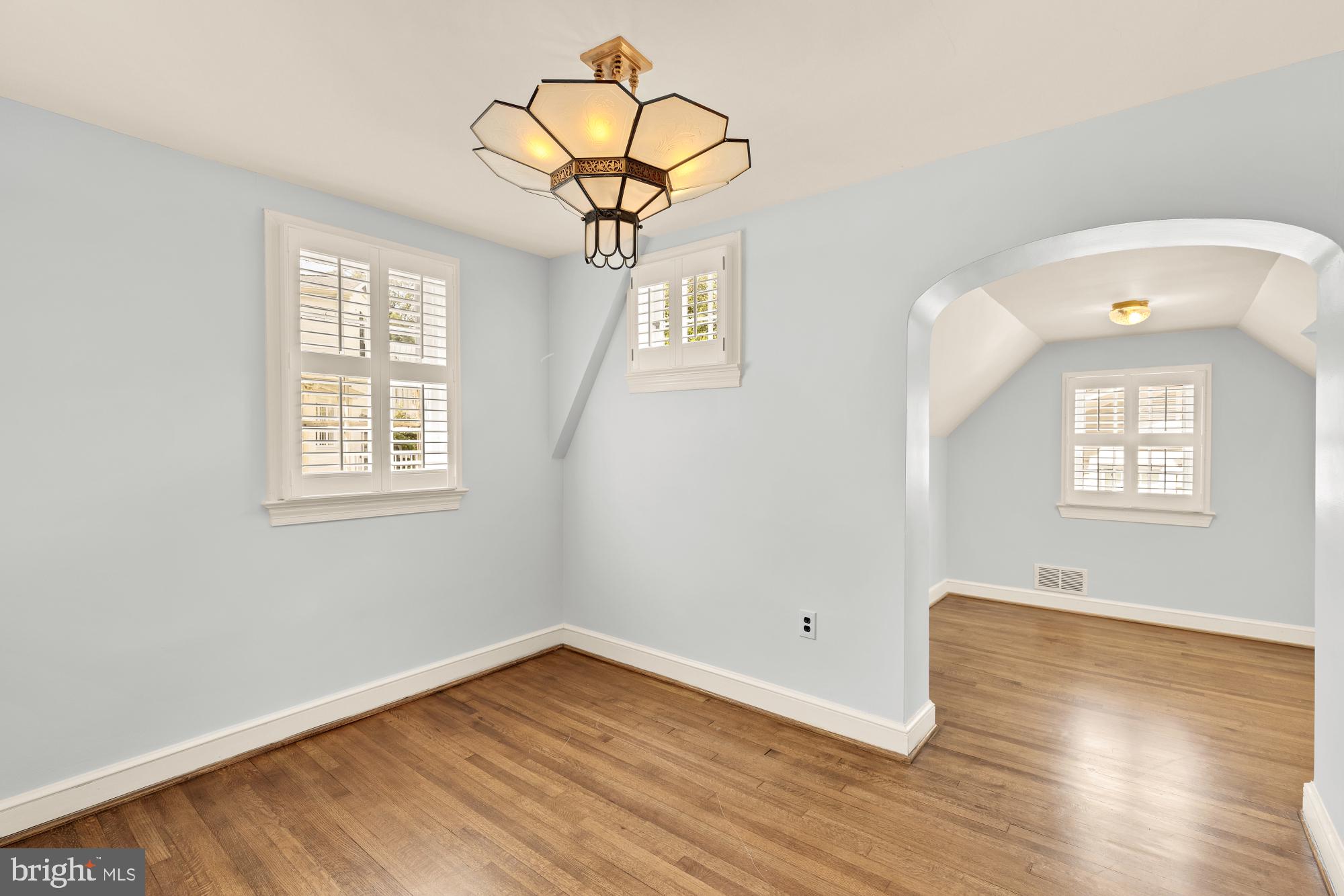 6038 Fort Hunt Road Alexandria, VA 22307 - Photo 36 of 49 a view of empty room with wooden floor and fan