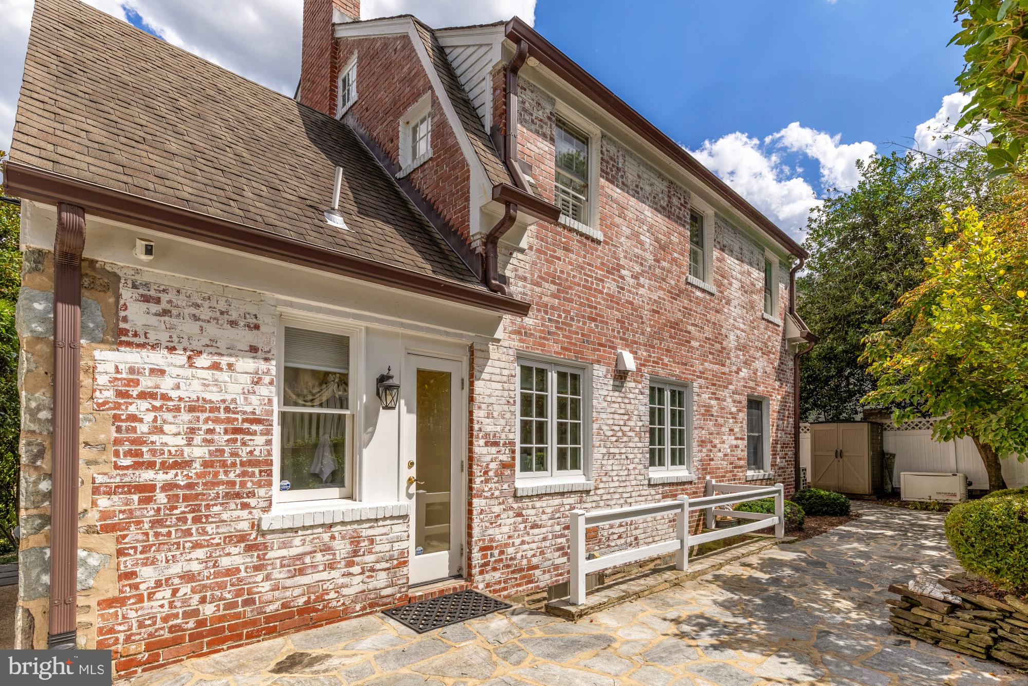 6038 Fort Hunt Road Alexandria, VA 22307 - Photo 45 of 49 a front view of a house with a tree