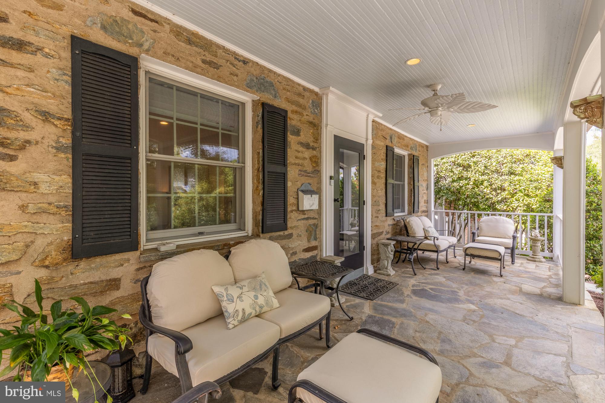 6038 Fort Hunt Road Alexandria, VA 22307 - Photo 5 of 49 a outdoor living space with furniture and a potted plant