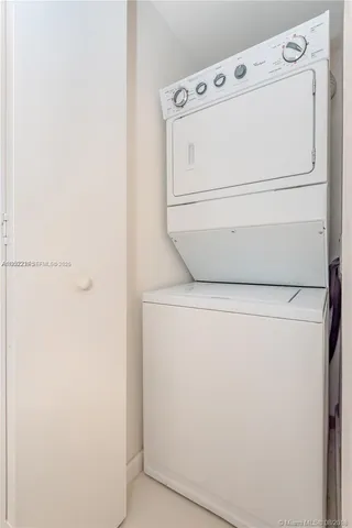 a view of empty room with a projector