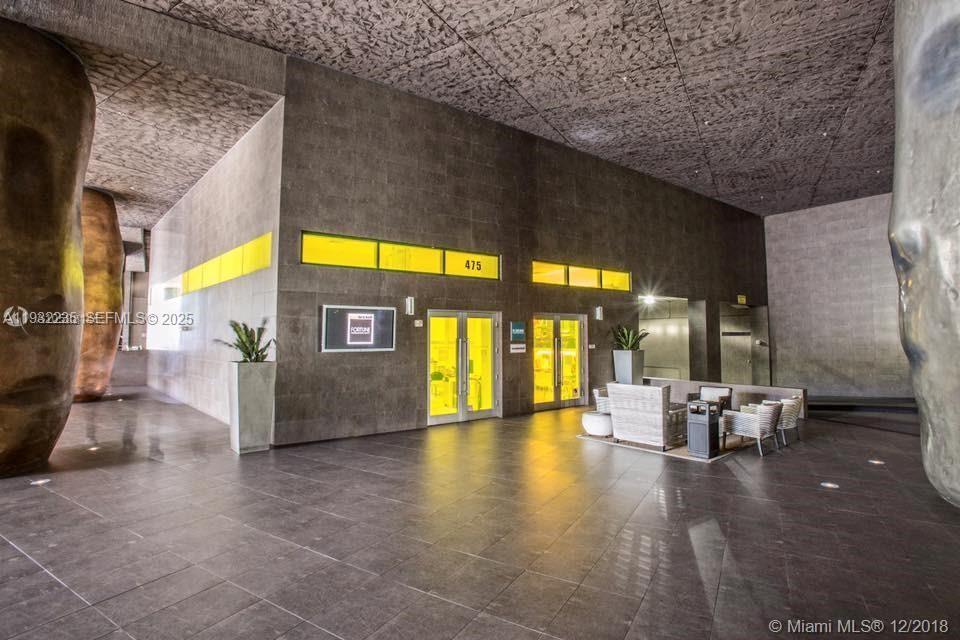 475 Brickell Avenue, Unit 3414 Miami, FL 33131 - Photo 19 of 24 a view of a porch with furniture and a patio