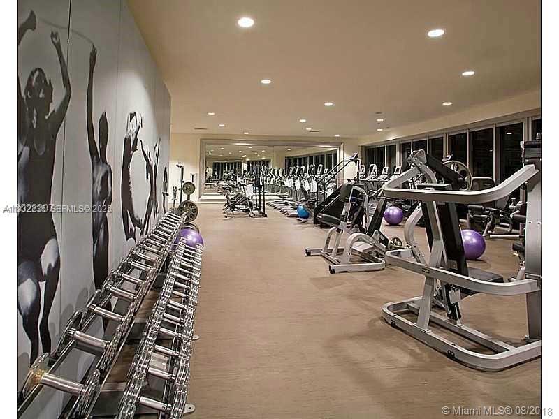 475 Brickell Avenue, Unit 3414 Miami, FL 33131 - Photo 21 of 24 a view of a room with gym equipment