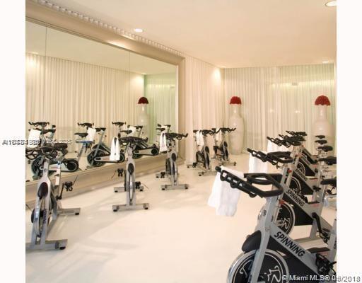 475 Brickell Avenue, Unit 3414 Miami, FL 33131 - Photo 23 of 24 a view of a room with gym equipment