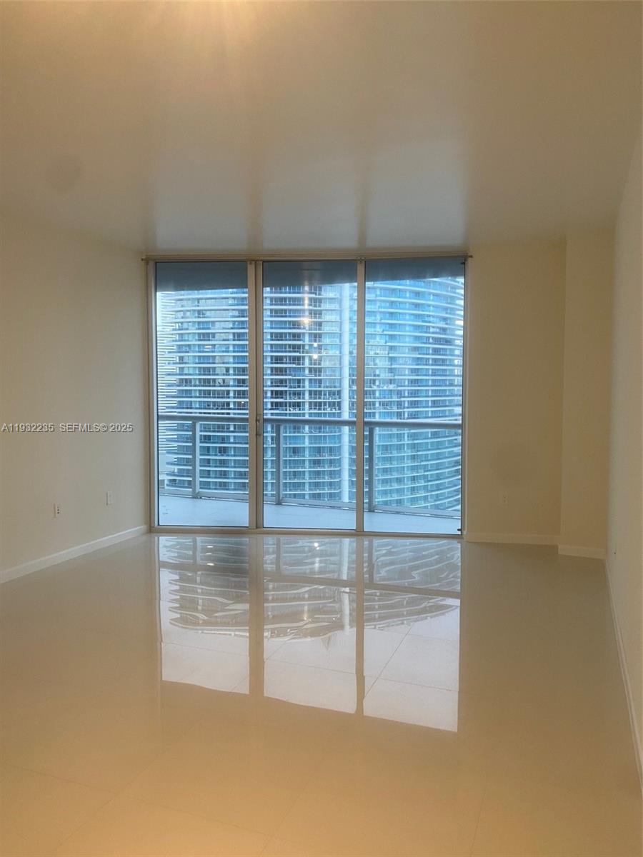475 Brickell Avenue, Unit 3414 Miami, FL 33131 - Photo 7 of 24 a view of an empty room with a window