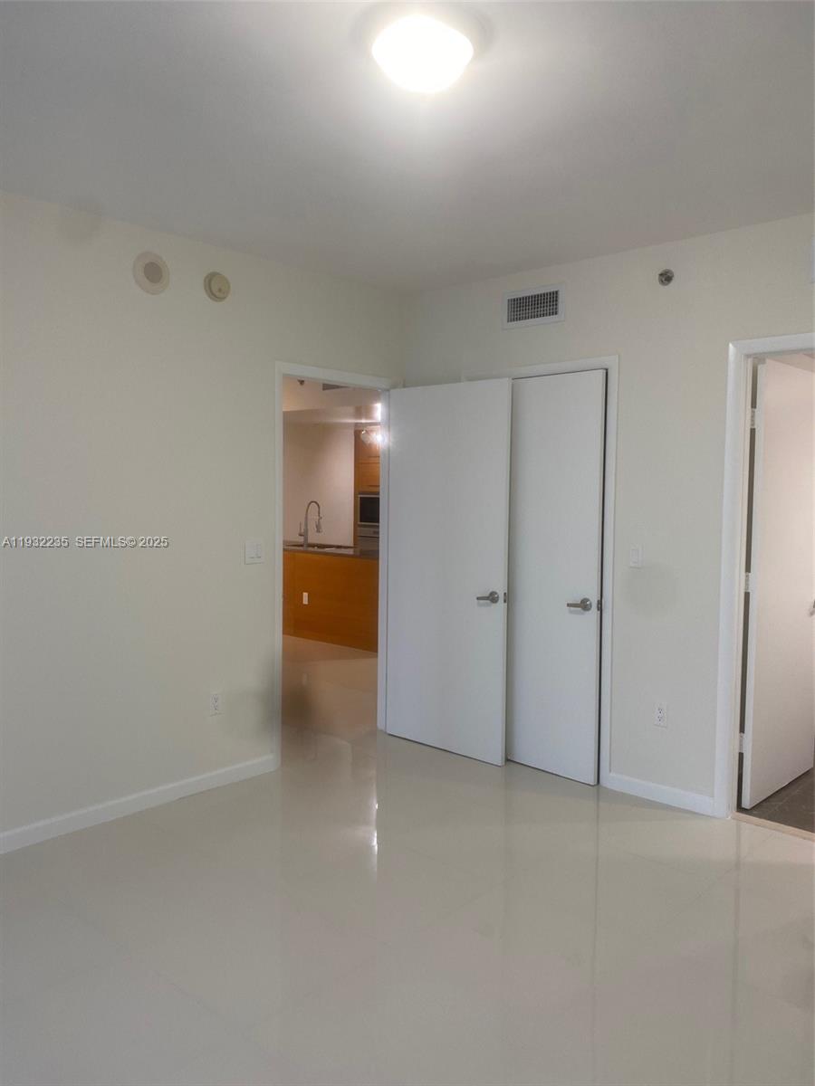 475 Brickell Avenue, Unit 3414 Miami, FL 33131 - Photo 10 of 24 a view of an empty room