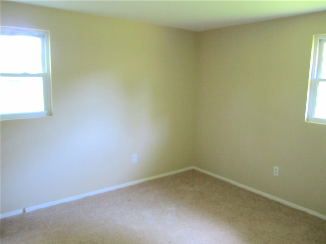 5576 Buckner Road Bumpass, VA 23024 - Photo 4 of 12 an empty room with a window