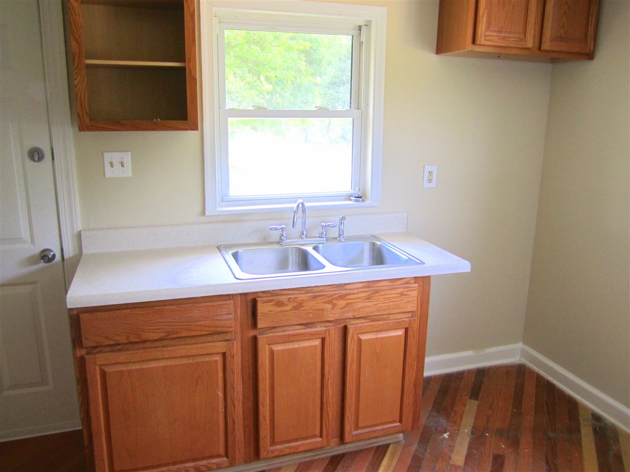 5576 Buckner Road Bumpass, VA 23024 - Photo 8 of 12 a utility room with a sink dryer and washer
