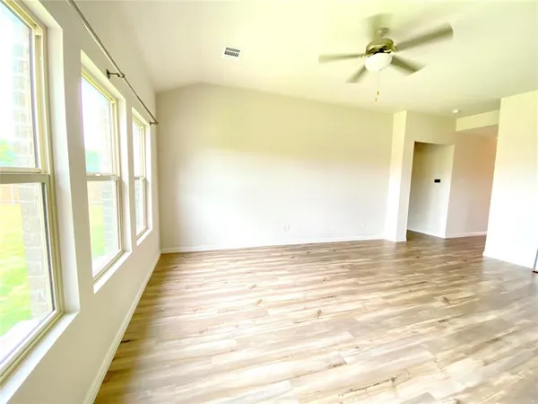 a view of an empty room and window