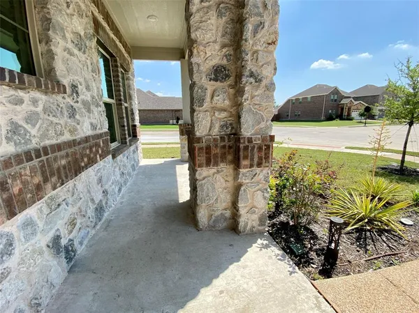 a view of a balcony with an outdoor space