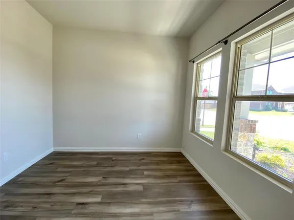 a view of an empty room and window