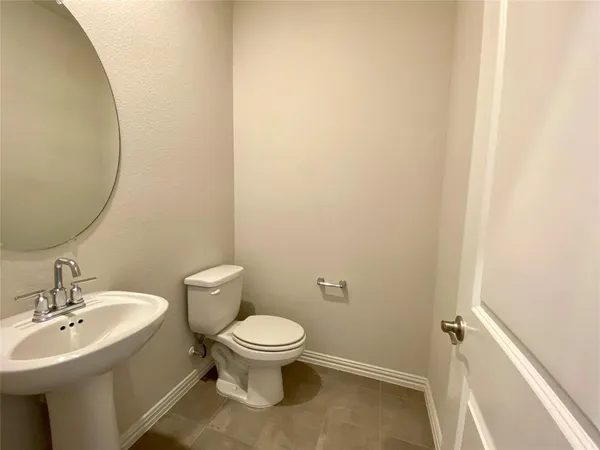 a view of small space with wooden floor