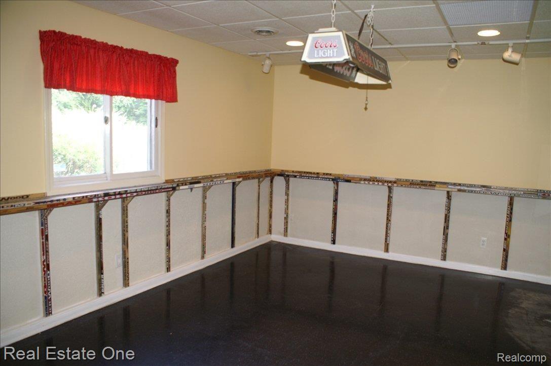 1955 White Lake Road Highland, MI 48356 - Photo 22 of 25 HOCKEY TOWN BASEMENT