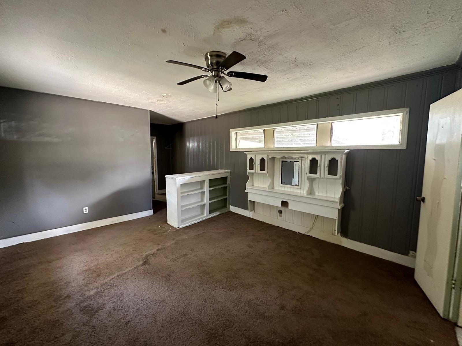 6818 Stearns Street Houston, TX 77021 - Photo 5 of 17 Sought-after downstairs bedroom with an adjacent full bath, offering privacy and convenience