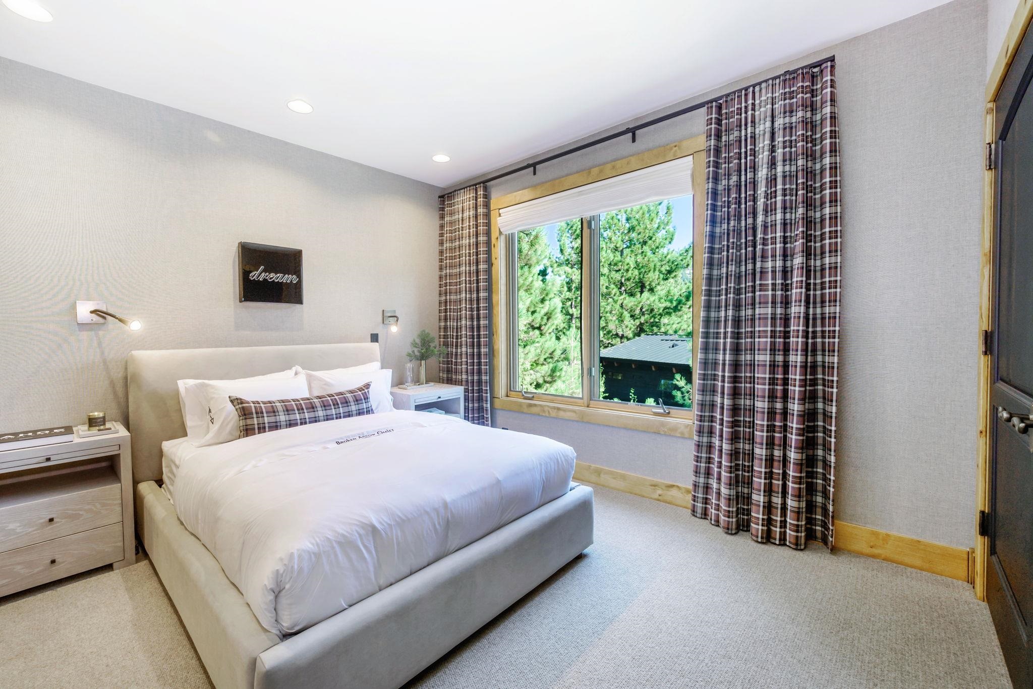 1301 Sandy Way Olympic Valley, CA 96146 - Photo 12 of 21 a bedroom with a bed and a window