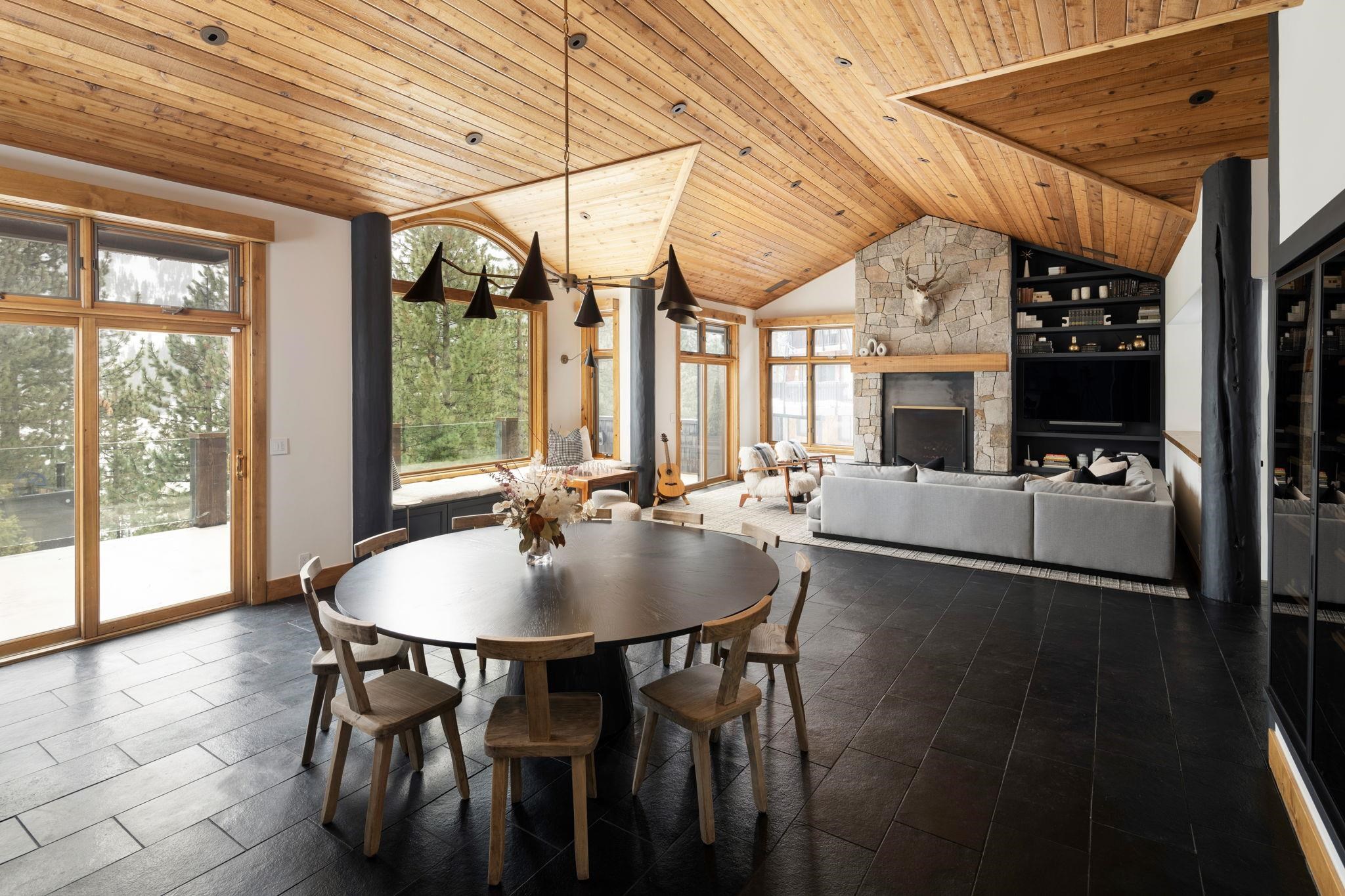 1301 Sandy Way Olympic Valley, CA 96146 - Photo 5 of 21 a view of a dining room with furniture large windows and wooden floor