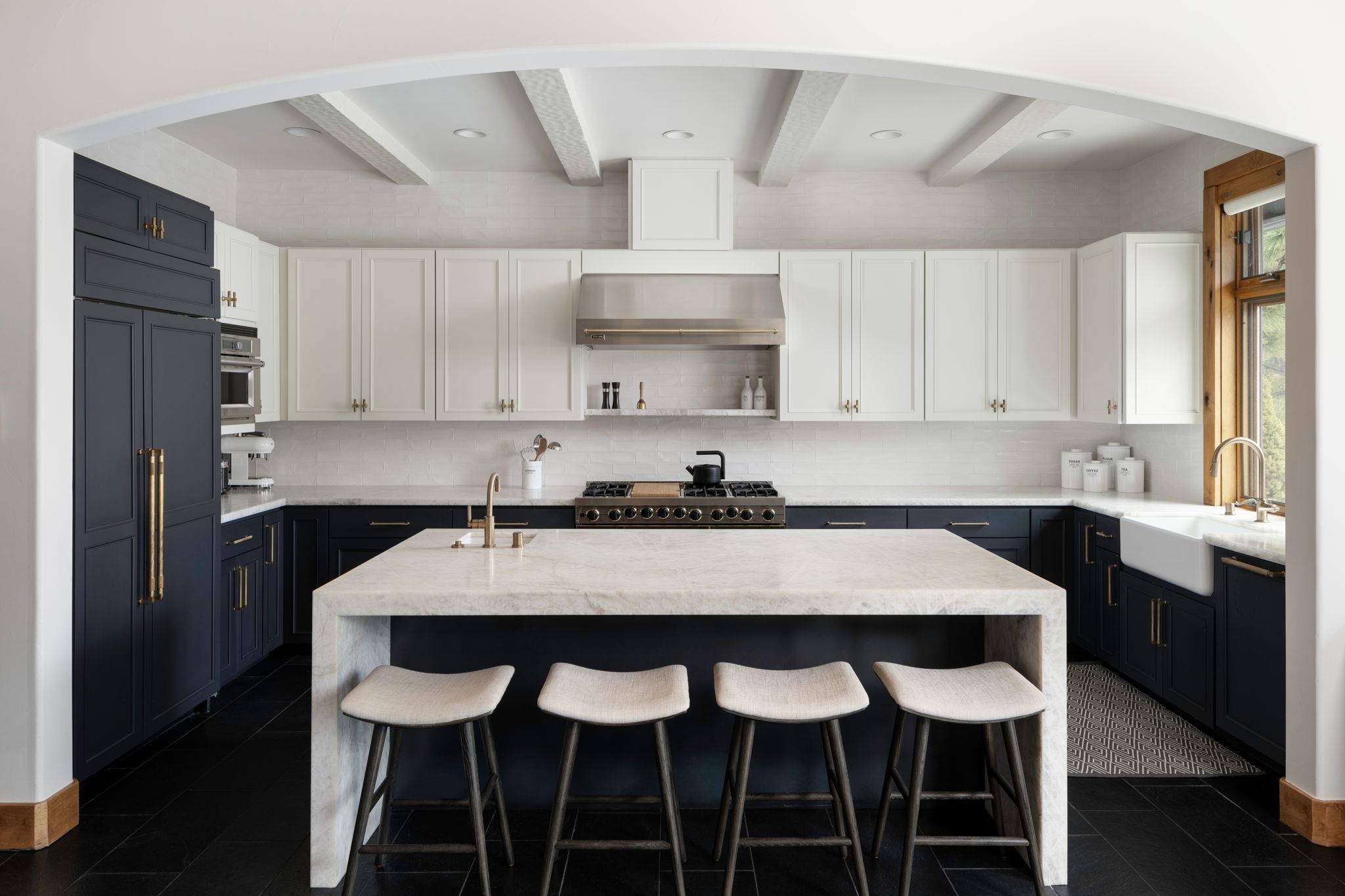 1301 Sandy Way Olympic Valley, CA 96146 - Photo 6 of 21 a kitchen with stainless steel appliances granite countertop a dining table chairs and a refrigerator