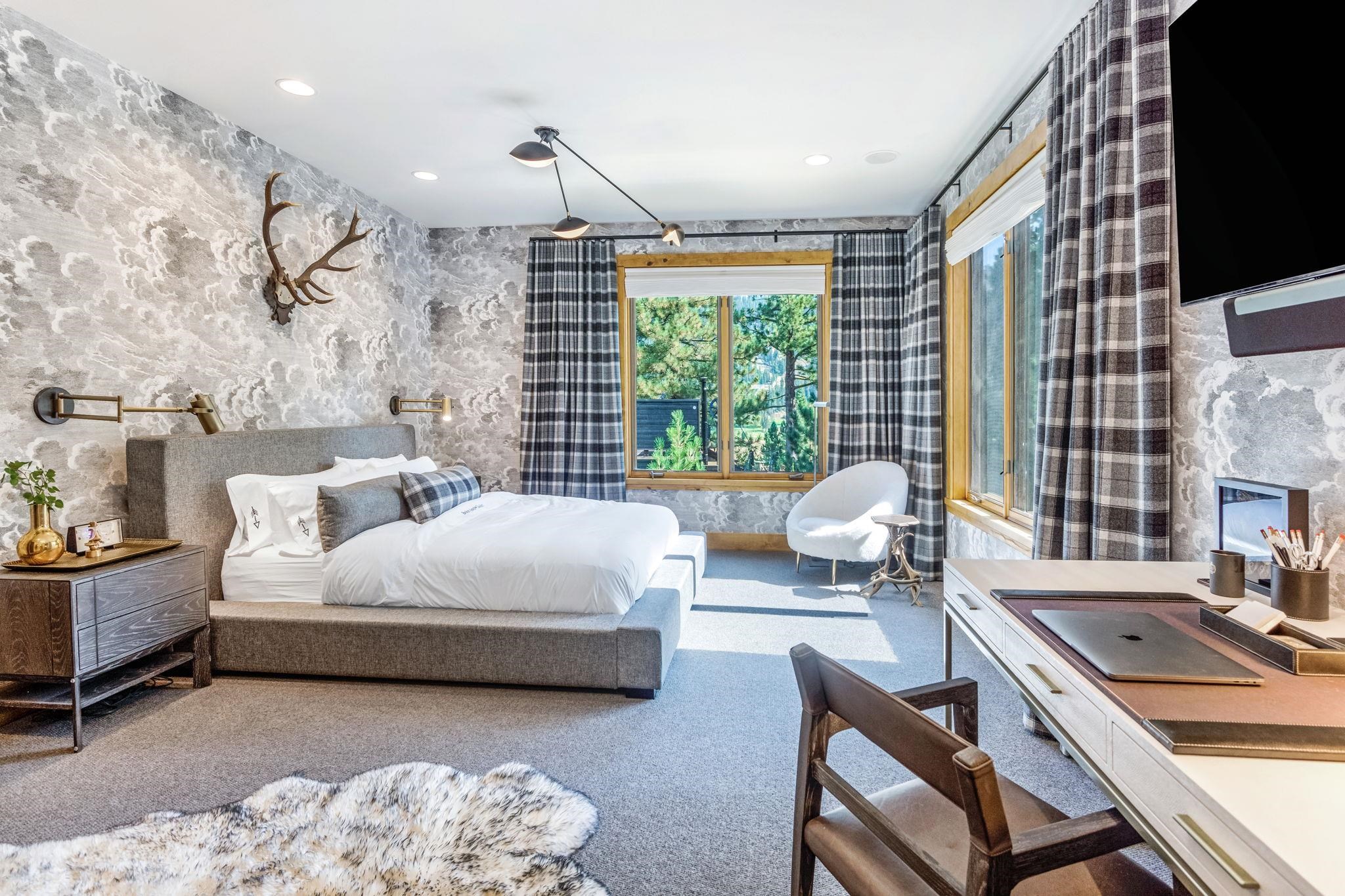 1301 Sandy Way Olympic Valley, CA 96146 - Photo 10 of 21 a spacious bedroom with a bed a couch and a flat tv screen