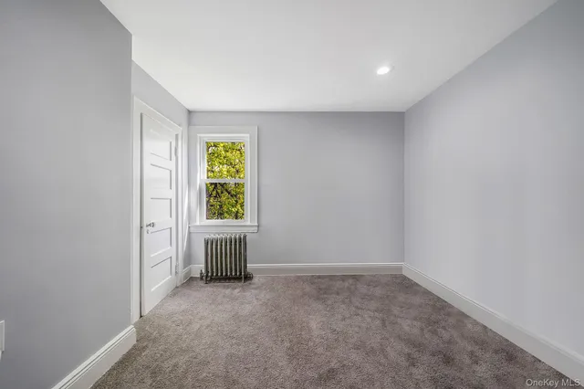 a view of an empty room with window