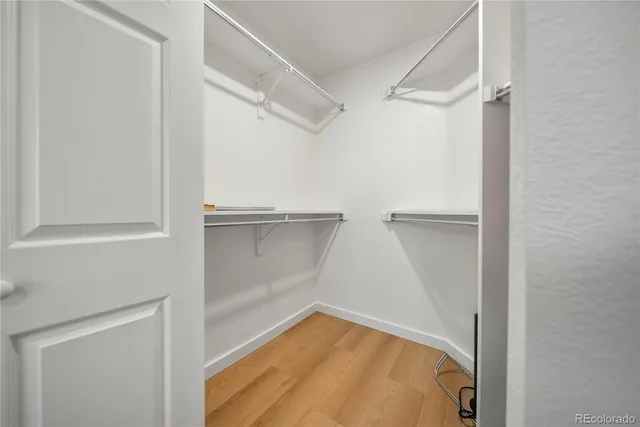 a view of an empty walk in closet