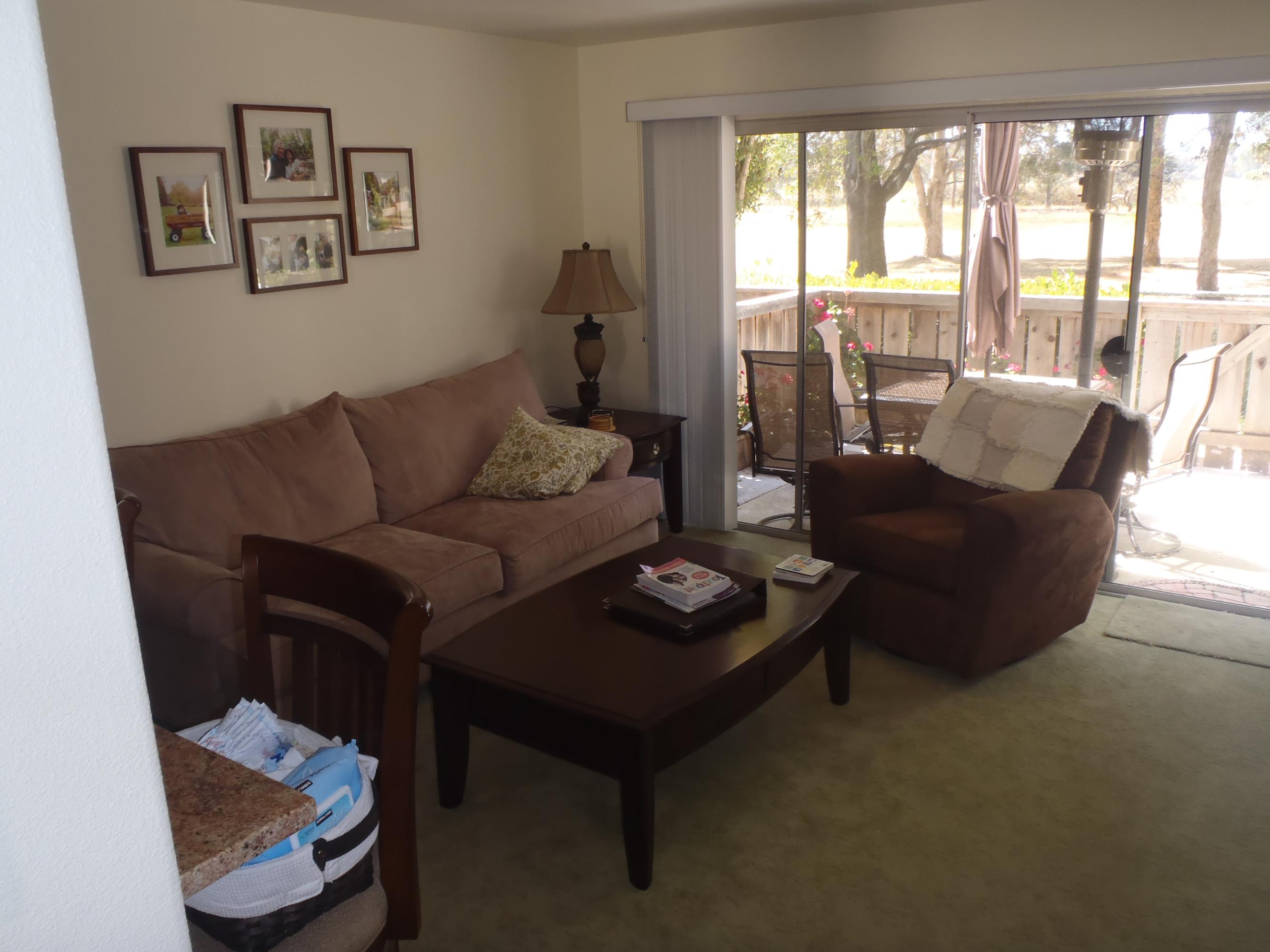538 Mills Way Goleta, CA 93117 - Photo 4 of 17 a living room with furniture and a floor to ceiling window