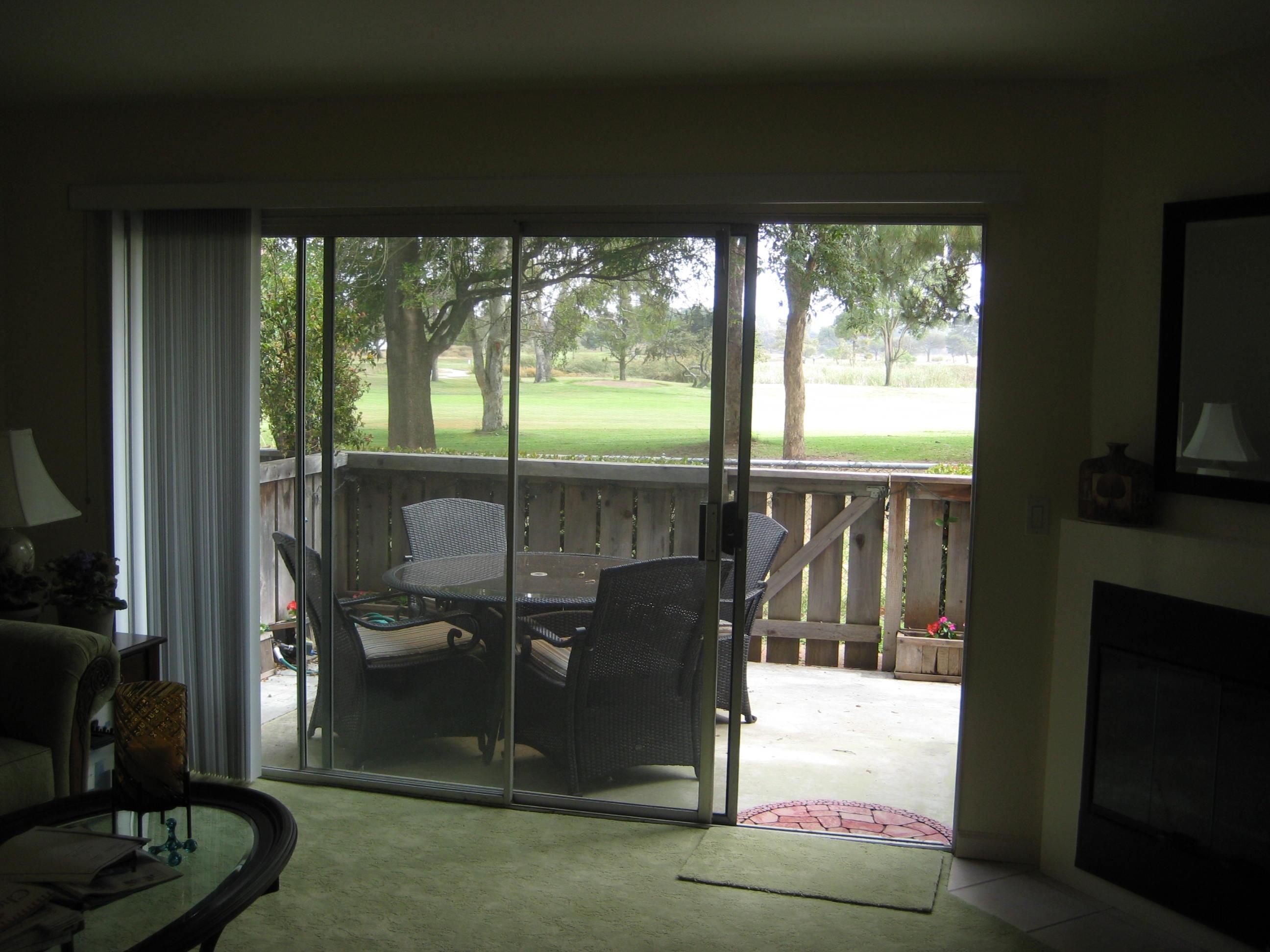 538 Mills Way Goleta, CA 93117 - Photo 5 of 17 a living room with hardwood floor and a floor to ceiling window