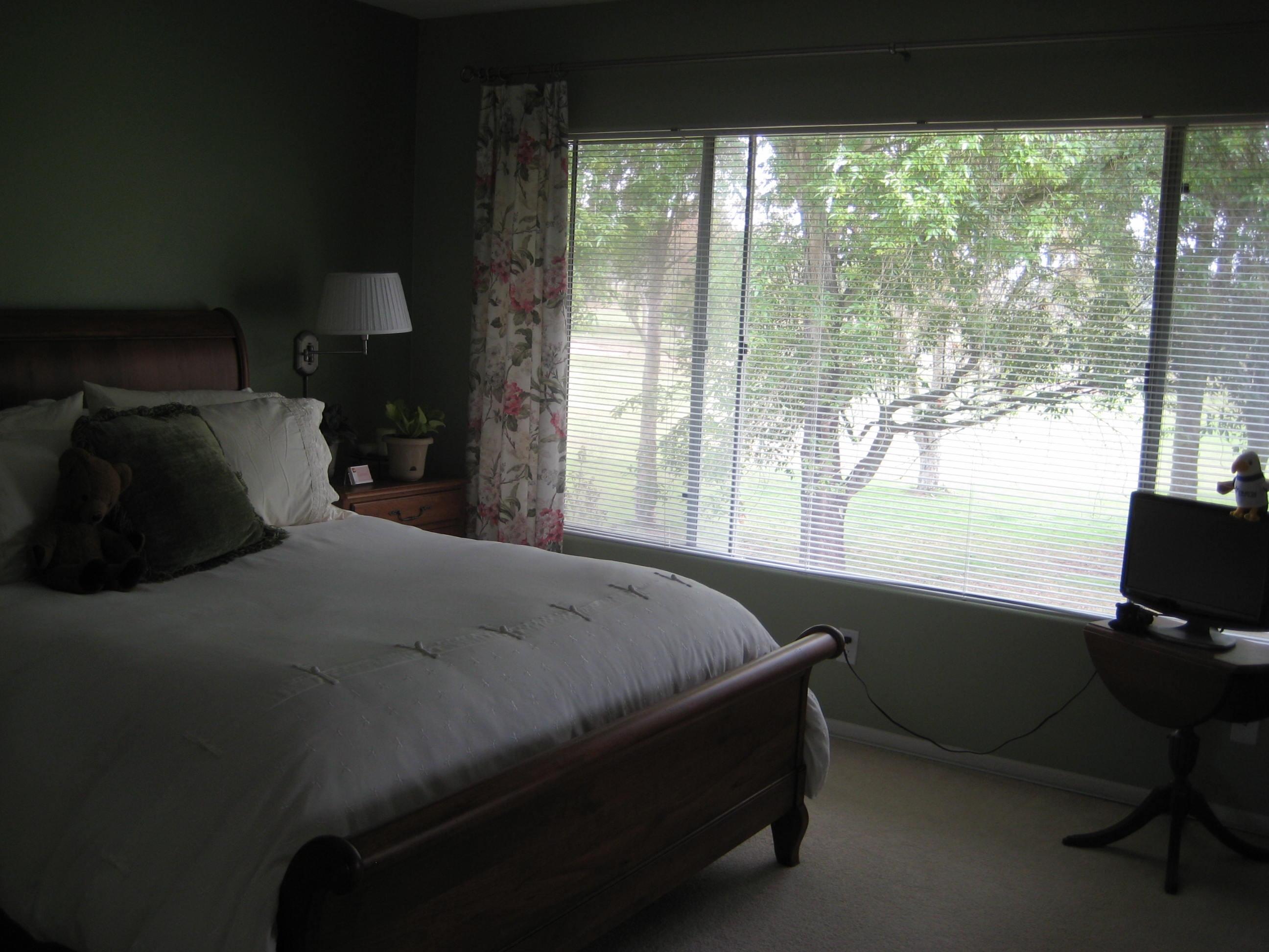 538 Mills Way Goleta, CA 93117 - Photo 7 of 17 a bed sitting in a bedroom next to a window