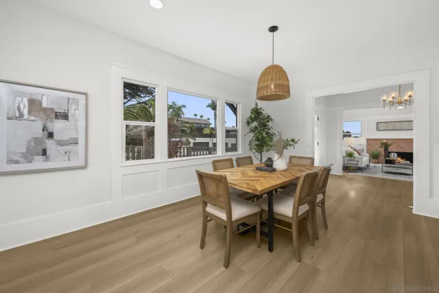 a view of living room and floor to ceiling window