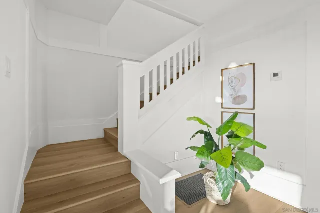 a bedroom with a bed and furniture