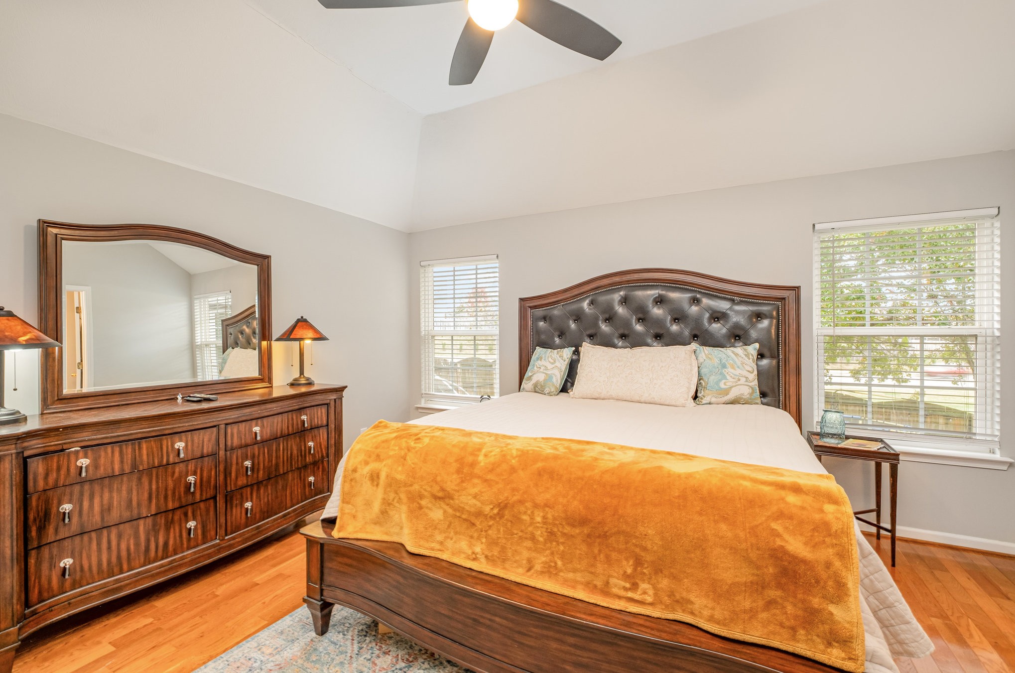 1312 Chapman Court Spring Hill, TN 37174 - Photo 12 of 27 a bedroom with a bed and a large mirror on the dresser