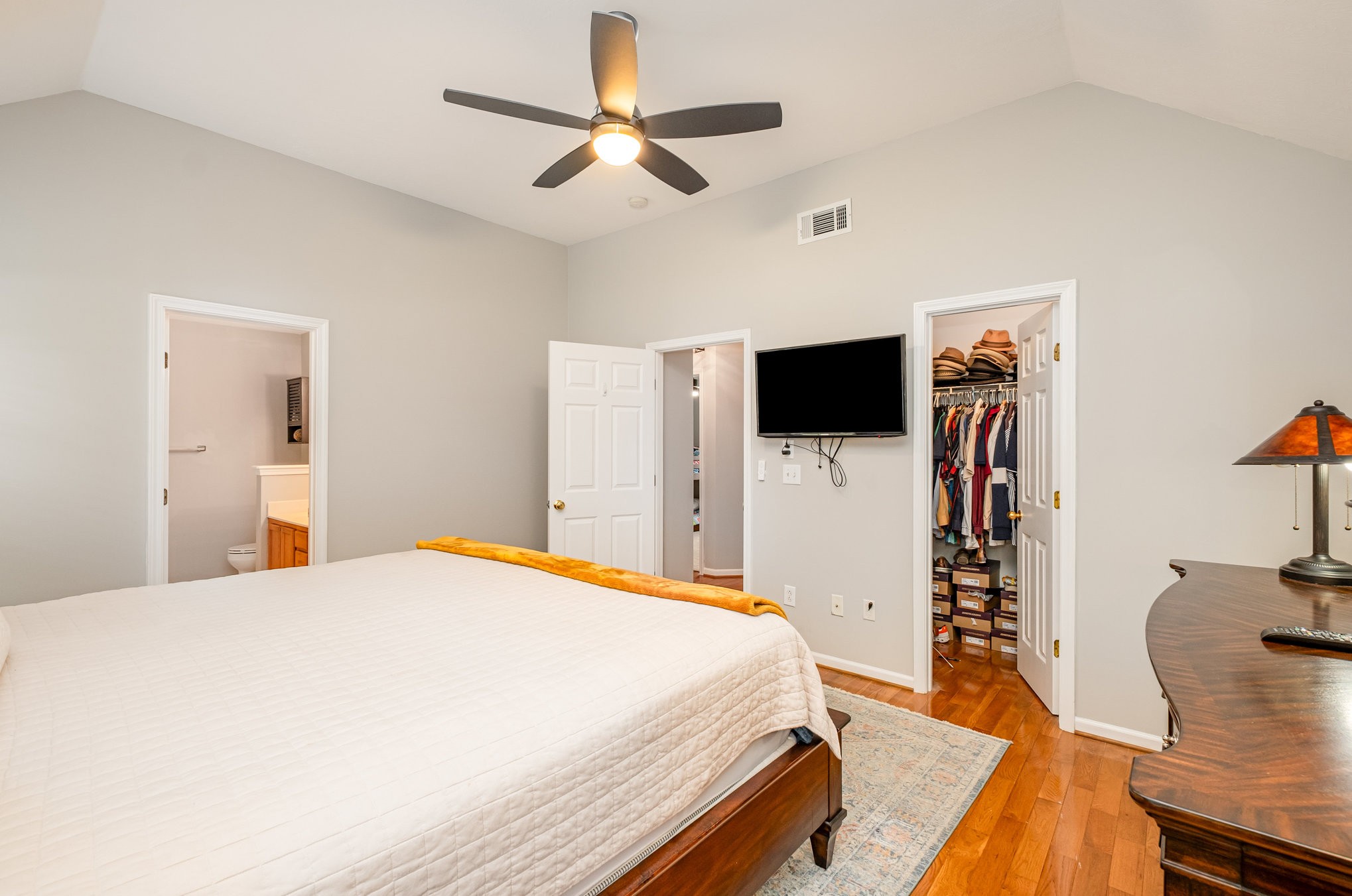 1312 Chapman Court Spring Hill, TN 37174 - Photo 13 of 27 a bedroom with a bed and a flat screen tv