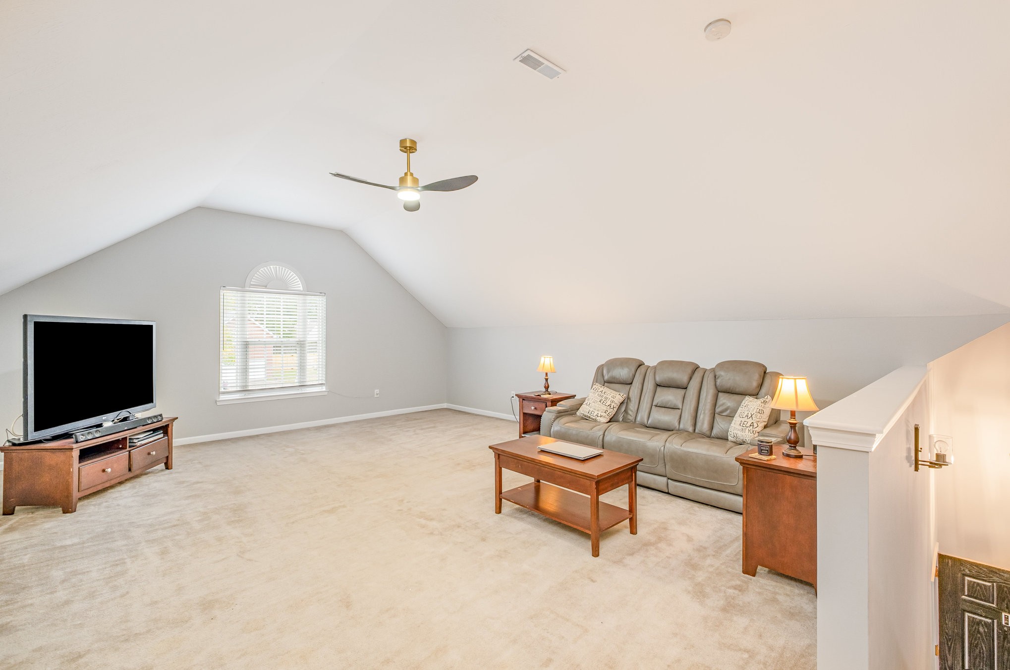 1312 Chapman Court Spring Hill, TN 37174 - Photo 19 of 27 a living room with furniture and a flat screen tv