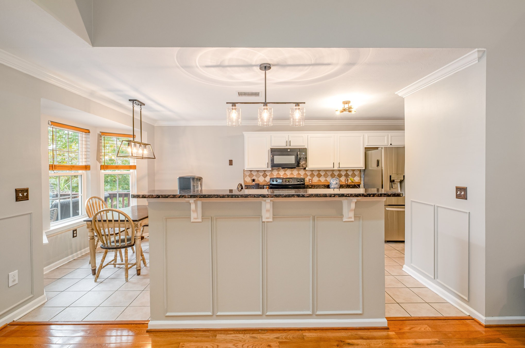 1312 Chapman Court Spring Hill, TN 37174 - Photo 8 of 27 a kitchen with counter top space and dining table