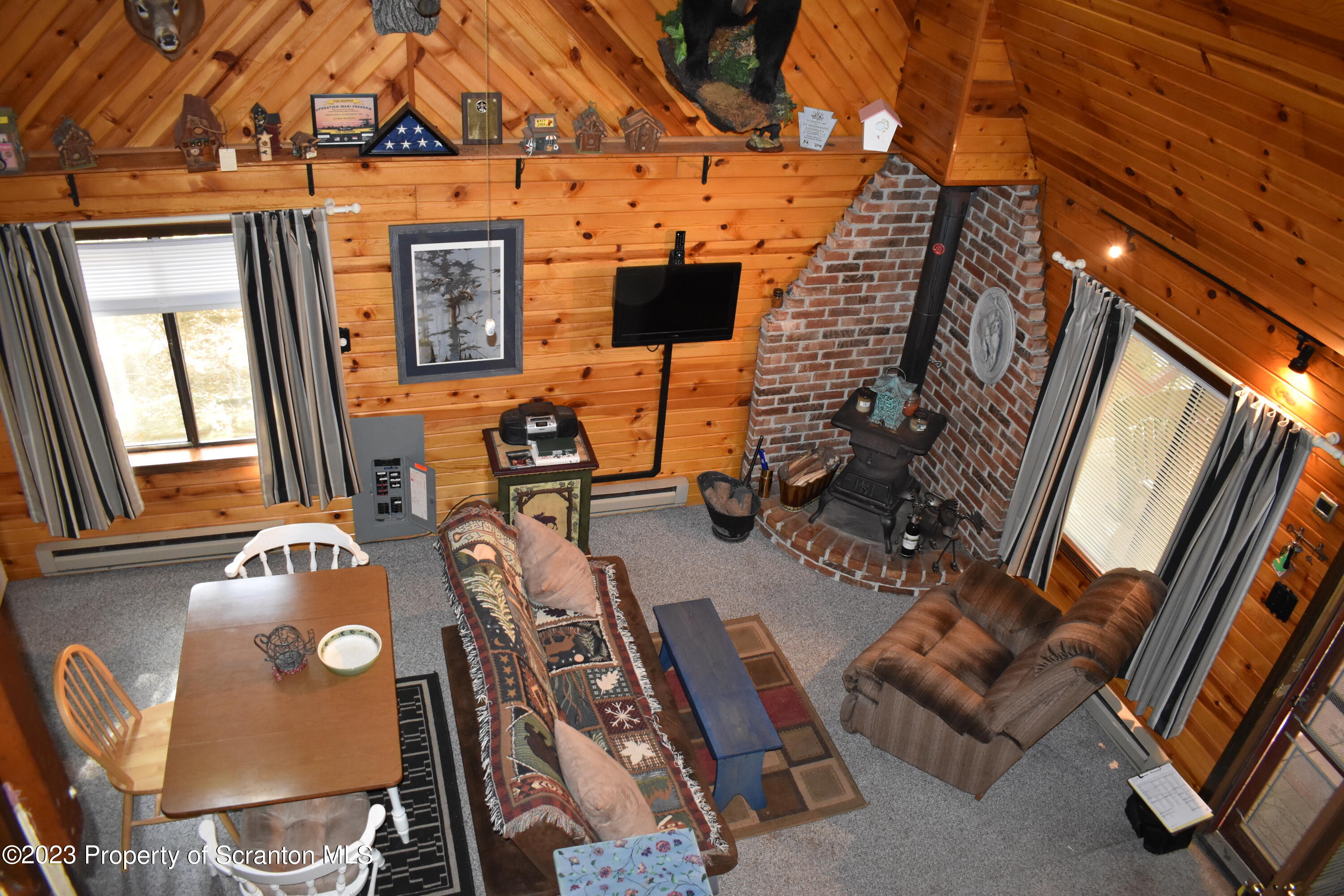 547 Camp Road New Milford, PA 18834 - Photo 5 of 27 a view of an outdoor space with seating area